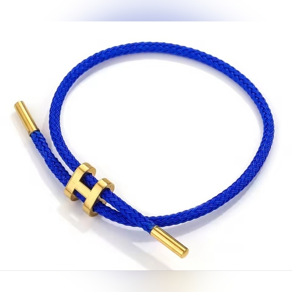 ✨ Blue Braided Cable Bracelet with Gold-Tone Accents ✨ - Picture 1 of 3